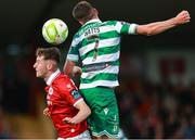 5 July 2025; Dylan Watts of Shamrock Rovers in action against James McManus of Sligo Rovers during the SSE Airtricity Men's Premier Division match between Sligo Rovers and Shamrock Rovers at The Showgrounds in Sligo. Photo by Thomas Flinkow/Sportsfile