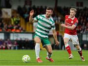 5 July 2025; Josh Honohan of Shamrock Rovers in action against Seb Quirk of Sligo Rovers during the SSE Airtricity Men's Premier Division match between Sligo Rovers and Shamrock Rovers at The Showgrounds in Sligo. Photo by Thomas Flinkow/Sportsfile