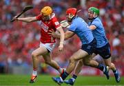 5 July 2025; Shane Barrett of Cork in action against Paddy Smyth, 3, and Conor McHugh of Dublin during the GAA Hurling All-Ireland Senior Championship semi-final match between Cork and Dublin at Croke Park in Dublin. Photo by Ray McManus/Sportsfile