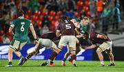 5 July 2025; Jamie Osborne of Ireland is tackled by Beka Saghinadze of Georgia during the International Rugby Test match between Georgia and Ireland at at Mikheil Meskhi Stadium in Tbilisi, Georgia. Photo by Brendan Moran/Sportsfile