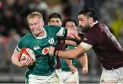 5 July 2025; Jamie Osborne of Ireland is tackled by Beka Saghinadze of Georgia during the International Rugby Test match between Georgia and Ireland at at Mikheil Meskhi Stadium in Tbilisi, Georgia. Photo by Brendan Moran/Sportsfile