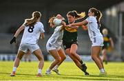 5 July 2025; Mary O'Connell of Kerry in action against Kildare players, from left, Lia Reilly, Laoise Lenehan and Ciara Wheeler during the TG4 All-Ireland Ladies Football Senior Championship quarter-final match between Kerry and Kildare at Austin Stack Park in Tralee, Kerry. Photo by Tyler Miller/Sportsfile