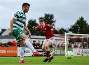 5 July 2025; Josh Honohan of Shamrock Rovers in action against Conor Reynolds of Sligo Rovers during the SSE Airtricity Men's Premier Division match between Sligo Rovers and Shamrock Rovers at The Showgrounds in Sligo. Photo by Thomas Flinkow/Sportsfile