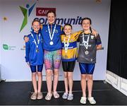 5 July 2025; The under-13 relay team from Co Clare that won silver from left Alannah Tabb, Jenna Lyons, Heidi Hughes and Emily Glynn during day one of the Cairn Community Games National Swimming, Quiz, Chess, Draughts and Gymnastics Finals 2025 at The Watershed in Kilkenny. Photo by Matt Browne/Sportsfile