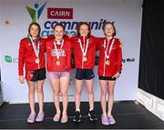 5 July 2025; Members of the under-13 relay team from Douglas Co Cork that won Gold from left, Una Casey, Mila Devitt, Lauren Jankowska and Eimear Burke during day one of the Cairn Community Games National Swimming, Quiz, Chess, Draughts and Gymnastics Finals 2025 at The Watershed in Kilkenny. Photo by Matt Browne/Sportsfile
