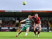 5 July 2025; Michael Noonan of Shamrock Rovers in action against Patrick McClean of Sligo Rovers during the SSE Airtricity Men's Premier Division match between Sligo Rovers and Shamrock Rovers at The Showgrounds in Sligo. Photo by Thomas Flinkow/Sportsfile