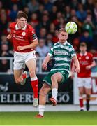 5 July 2025; Michael Noonan of Shamrock Rovers in action against Seb Quirk of Sligo Rovers during the SSE Airtricity Men's Premier Division match between Sligo Rovers and Shamrock Rovers at The Showgrounds in Sligo. Photo by Thomas Flinkow/Sportsfile
