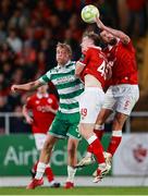 5 July 2025; Michael Noonan of Shamrock Rovers in action against Patrick McClean, right, and Jake Doyle-Hayes of Sligo Rovers during the SSE Airtricity Men's Premier Division match between Sligo Rovers and Shamrock Rovers at The Showgrounds in Sligo. Photo by Thomas Flinkow/Sportsfile