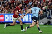 5 July 2025; Hugo Keenan of British & Irish Lions in action against Teddy Wilson of NSW Waratahs during the tour match between NSW Waratahs and the British & Irish Lions at the Allianz Stadium in Sydney, Australia. Photo by Steve Christo/Sportsfile