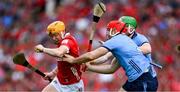 5 July 2025; Shane Barrett of Cork in action against Paddy Smyth of Dublin during the Glen Dimplex Senior All-Ireland Camogie Championship quarter-final match between Clare and Waterford at Croke Park in Dublin. Photo by Ray McManus/Sportsfile