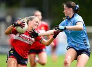 5 July 2025; Abigail Ring of Cork in action against Hannah McGinnis of Dublin during the TG4 All-Ireland Ladies Football Senior Championship quarter-final match between Dublin and Cork at Parnell Park in Dublin. Photo by Seb Daly/Sportsfile