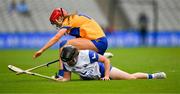 5 July 2025; Orla Hickey of Waterford in action against Jennifer Daly of Clare during the Glen Dimplex Senior All-Ireland Camogie Championship quarter-final match between Clare and Waterford at Croke Park in Dublin. Photo by Ray McManus/Sportsfile