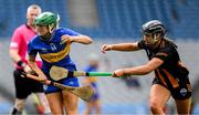 6 July 2025; Casey Hennessy of Tipperary is tackled by Tiffanie Fitzgerald of Kilkenny during the Glen Dimplex Senior All-Ireland Camogie Championship quarter-final match between Kilkenny and Tipperary at Croke Park in Dublin. Photo by Ray McManus/Sportsfile