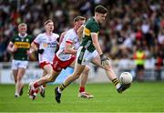 6 July 2025; Gearóid White of Kerry gets away from Darren McAnespie of Tyrone during the Electric Ireland GAA Football All-Ireland Minor Championship final match between Kerry and Tyrone at Cedral St Conleth's Park in Newbridge, Kildare. Photo by Piaras Ó Mídheach/Sportsfile