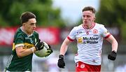 6 July 2025; Danny Murphy of Kerry in action against James Daly of Tyrone during the Electric Ireland GAA Football All-Ireland Minor Championship final match between Kerry and Tyrone at Cedral St Conleth's Park in Newbridge, Kildare. Photo by Piaras Ó Mídheach/Sportsfile