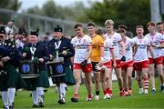 6 July 2025; Tyrone captain Pádraig Donaghy leads his side in the parade before the Electric Ireland GAA Football All-Ireland Minor Championship final match between Kerry and Tyrone at Cedral St Conleth's Park in Newbridge, Kildare. Photo by Piaras Ó Mídheach/Sportsfile