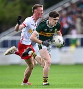 6 July 2025; Gearóid White of Kerry in action against Darren McAnespie of Tyrone during the Electric Ireland GAA Football All-Ireland Minor Championship final match between Kerry and Tyrone at Cedral St Conleth's Park in Newbridge, Kildare. Photo by Piaras Ó Mídheach/Sportsfile