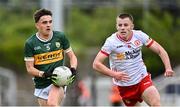 6 July 2025; Danny Murphy of Kerry gets away from James Mulgrew of Tyrone during the Electric Ireland GAA Football All-Ireland Minor Championship final match between Kerry and Tyrone at Cedral St Conleth's Park in Newbridge, Kildare. Photo by Piaras Ó Mídheach/Sportsfile