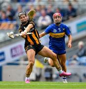 6 July 2025; Katie Power of Kilkenny under pressure from Karin Blair of Tipperary scores a point, in the 37th minute, during the Glen Dimplex Senior All-Ireland Camogie Championship quarter-final match between Kilkenny and Tipperary at Croke Park in Dublin. Photo by Ray McManus/Sportsfile
