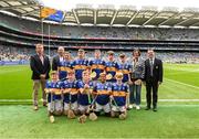 6 July 2025; Camogie Association president Brian Molloy, Cathaoirleach Comhairle Laighean Derek Kent, INTO President Anne Horan, and Gary Farrell, President of Cumann na mBunscol Gary Farrell, with the Tipperary team, back row, left to right, Seán Allen, St Joseph's PS, Dungannon, Tyrone, Daire McCawley, St Clare's NS, Manorhamilton, Leitrim, Rory McNulty, St Mary's NS, Drumbibe, Aughnasheelin, Leitrim, Matthew Quirke, Clonoulty CNS, Cashel, Tipperary, David McElligott, Scoil Naomh Sheosaimh, Nenagh, Tipperary, front row, left to right, Martin O'Farrell, Primate Dixon PS, Coalisland, Tyrone, Ryan Clogher, St Coman's Wood PS, Ardnanagh, Roscommon, Pádraic Melanophy, St Naile's PS, Kinawley, Fermanagh, Brendan Sampson, Bunscoil an Traonaigh, Lisnaskea, Fermanagh, Aaron O'Mahony, Glenville NS, Glenville, Cork, before the GAA INTO Cumann na mBunscol Respect Exhibition Go Games at the GAA Hurling All-Ireland Senior Championship semi-final match between Kilkenny and Tipperary at Croke Park in Dublin. Photo by Daire Brennan/Sportsfile