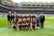 6 July 2025; Camogie Association president Brian Molloy, Cathaoirleach Comhairle Laighean Derek Kent, INTO President Anne Horan, and Gary Farrell, President of Cumann na mBunscol Gary Farrell, with the Kilkenny team, back row, left to right, Hannah Kate McKinney, St Mura's NS, Tooban, Donegal, Laura Fitzgerald, St Colman's NS, Clara, Kilkenny, Eilís Ní Ruagáin, Gaelscoil Phortlaoise, Portlaoise, Louth, Poppy Browne, Holy Family Senior School, Portlaoise, Laois, Kate Neary, St Aidan's NS, Kilmanagh, Kilkenny, front row, left to right, Leah McLoughlin, Melvin NS, Melview, Longford, Molly Mí Raghallaigh, Gaelscoil Uí Fhiaich, Maigh Nuad, Cill Dara, Emer Quinn, Scoil Bhríde, Clane, Kildare, Clodagh Behan, GS Bhrian Boróimhe, Sord, Áth Cliath, Máire Ní Chaoinleáin, GS Chluain Dolcáin, Cluain Dolcáin, Áth Cliath, before the GAA INTO Cumann na mBunscol Respect Exhibition Go Games at the GAA Hurling All-Ireland Senior Championship semi-final match between Kilkenny and Tipperary at Croke Park in Dublin. Photo by Daire Brennan/Sportsfile