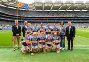6 July 2025; Camogie Association president Brian Molloy, Cathaoirleach Comhairle Laighean Derek Kent, INTO President Anne Horan, and Gary Farrell, President of Cumann na mBunscol Gary Farrell, with the Tipperary team, back row, left to right, Alice Burrows, St Joseph's NS, Westport, Mayo, Amelia Ryan, Brackloon NS, Westport, Mayo, Ella McDaid, St Aengus NS, Brigend, Donegal, Mia Kelly, Ballymurray NS, Ballymurray, Roscommon, Aimee Toner, Foley PS, Ballymacnab Road, Armagh, front row, left to right, Ava Higgins, St Patrick's NS, Calry, Sligo, Orna McKenna, Scoil Naomh Eirc, Ardfert, Kerry, Aoibh McCarthy, Scoil Mháirtín, Kilworth, Cork, Siobhán Donnelly, St Jarlath's PS, Blackwatertown, Armagh, and Emma Diggin, Scoil Chríost Rí, Drumnacurra, before the GAA INTO Cumann na mBunscol Respect Exhibition Go Games at the GAA Hurling All-Ireland Senior Championship semi-final match between Kilkenny and Tipperary at Croke Park in Dublin. Photo by Daire Brennan/Sportsfile