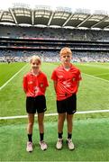 6 July 2025; Referees Liam McMahon, Stonehall NS, Newmarket, Clare, and Caoileann Cooney, Ballyea NS, Ballyea, Ennis, Clare, before the GAA INTO Cumann na mBunscol Respect Exhibition Go Games at the GAA Hurling All-Ireland Senior Championship semi-final match between Kilkenny and Tipperary at Croke Park in Dublin. Photo by Daire Brennan/Sportsfile