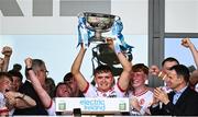 6 July 2025; Pádraig Donaghy of Tyrone lifts the cup after the Electric Ireland GAA Football All-Ireland Minor Championship final match between Kerry and Tyrone at Cedral St Conleth's Park in Newbridge, Kildare. Photo by Piaras Ó Mídheach/Sportsfile