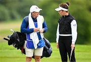 6 July 2025; Georgia Hall of England and Former Irsih golfer and caddie Paul Dunne during day four of the 2025 KPMG Women’s Irish Open Golf Championship at Carton House Golf Club in Maynooth, Kildare. Photo by Seb Daly/Sportsfile