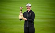 6 July 2025; Lottie Woad of England celebrates with the trophy after winning the 2025 KPMG Women’s Irish Open Golf Championship at Carton House Golf Club in Maynooth, Kildare. Photo by Seb Daly/Sportsfile