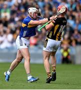 6 July 2025; Eoghan Connolly  of Tipperary and Adrian Mullen of Kilkenny tussle during the GAA Hurling All-Ireland Senior Championship semi-final match between Kilkenny and Tipperary at Croke Park in Dublin. Photo by David Fitzgerald/Sportsfile