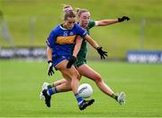 6 July 2025; Katelyn Downey  of Tipperary in action against Aoibhín Cleary of Meath during the TG4 All-Ireland Ladies Football Senior Championship quarter-final match between Meath and Tipperary at Páirc Tailteann in Navan, Meath. Photo by Stephen Marken/Sportsfile