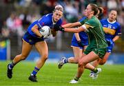 6 July 2025; Katelyn Downey of Tipperary in action against Aoibhín Cleary of Meath during the TG4 All-Ireland Ladies Football Senior Championship quarter-final match between Meath and Tipperary at Páirc Tailteann in Navan, Meath. Photo by Stephen Marken/Sportsfile