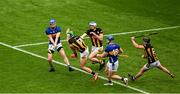 6 July 2025; John McGrath of Tipperary scores a point despite the efforts of Paddy Deegan, left, and Huw Lawlor of Kilkenny during the GAA Hurling All-Ireland Senior Championship semi-final match between Kilkenny and Tipperary at Croke Park in Dublin. Photo by Daire Brennan/Sportsfile