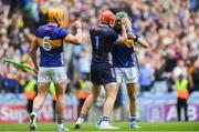 6 July 2025; Tipperary players, from left, Ronan Maher, Rhys Shelly and Robert Doyle celebrate at the final whistle after the GAA Hurling All-Ireland Senior Championship semi-final match between Kilkenny and Tipperary at Croke Park in Dublin. Photo by John Sheridan/Sportsfile