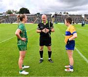 6 July 2025; Referee Shane Curley and team captains Aoibhín Cleary of Meath and Lauren Fitzpatrick of Tipperary before the TG4 All-Ireland Ladies Football Senior Championship quarter-final match between Meath and Tipperary at Páirc Tailteann in Navan, Meath. Photo by Stephen Marken/Sportsfile