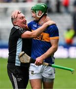 6 July 2025; Noel McGrath of Tipperary is congratulated by Shamie Butler, the Tipperary kitman, after the GAA Hurling All-Ireland Senior Championship semi-final match between Kilkenny and Tipperary at Croke Park in Dublin. Photo by Ray McManus/Sportsfile
