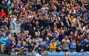 6 July 2025; Tipperary supporters celebrate as Noel McGrath watches his point go over during the GAA Hurling All-Ireland Senior Championship semi-final match between Kilkenny and Tipperary at Croke Park in Dublin. Photo by David Fitzgerald/Sportsfile