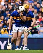 6 July 2025; Darragh McCarthy of Tipperary, left, is consoled by team-mate Jake Morris as he leaves the pitch after he was sent off by referee James Owens during the GAA Hurling All-Ireland Senior Championship semi-final match between Kilkenny and Tipperary at Croke Park in Dublin. Photo by Piaras Ó Mídheach/Sportsfile