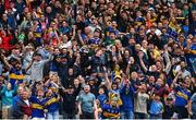 6 July 2025; Tipperary supporters celebrate as Noel McGrath watches his point go over during the GAA Hurling All-Ireland Senior Championship semi-final match between Kilkenny and Tipperary at Croke Park in Dublin. Photo by David Fitzgerald/Sportsfile