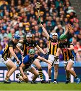 6 July 2025; Darragh Stakelum of Tipperary under pressure from Kilkenny players, from left, Stephen Donnelly, TJ Reid and Martin Keoghan during the GAA Hurling All-Ireland Senior Championship semi-final match between Kilkenny and Tipperary at Croke Park in Dublin. Photo by Ramsey Cardy/Sportsfile