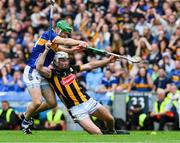 6 July 2025; Mikey Carey of Kilkenny is tackled by Noel McGrath of Tipperary during the GAA Hurling All-Ireland Senior Championship semi-final match between Kilkenny and Tipperary at Croke Park in Dublin. Photo by Ray McManus/Sportsfile