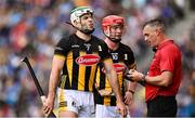 6 July 2025; Referee James Owens speaking with Paddy Deegan, left, and Adrian Mullen of Kilkenny during the GAA Hurling All-Ireland Senior Championship semi-final match between Kilkenny and Tipperary at Croke Park in Dublin. Photo by Piaras Ó Mídheach/Sportsfile