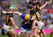 6 July 2025; Jake Morris of Tipperary is tackled by Paddy Deegan, left, and Mikey Butler of Kilkenny during the GAA Hurling All-Ireland Senior Championship semi-final match between Kilkenny and Tipperary at Croke Park in Dublin. Photo by Ray McManus/Sportsfile