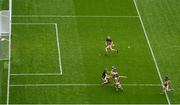 6 July 2025; Jason Forde of Tipperary scores his side's third goal past Kilkenny goalkeeper Eoin Murphy and Shane Murphy during the GAA Hurling All-Ireland Senior Championship semi-final match between Kilkenny and Tipperary at Croke Park in Dublin. Photo by Ramsey Cardy/Sportsfile