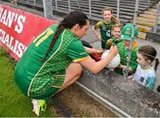 6 July 2025; Niamh Gallogly of Meath signs autographs after her side's victory in the TG4 All-Ireland Ladies Football Senior Championship quarter-final match between Meath and Tipperary at Páirc Tailteann in Navan, Meath. Photo by Stephen Marken/Sportsfile