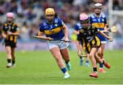 6 July 2025; Molly Mí Raghallaigh, Gaelscoil Uí Fhiaich, Maigh Nuad, Cill Dara, representing Kilkenny in action against Ella McDaid, St Aengus NS, Brigend, Donegal, representing Tipperary during the GAA INTO Cumann na mBunscol Respect Exhibition Go Games match at the GAA Hurling All-Ireland Senior Championship semi-final match between Kilkenny and Tipperary at Croke Park in Dublin. Photo by David Fitzgerald/Sportsfile