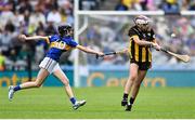 6 July 2025; Laura Fitzgerald, St Colman's NS, Clara, Kilkenny in action against Mia Kelly, Ballymurray NS, Ballymurray, Roscommon, representing Tipperary during the GAA INTO Cumann na mBunscol Respect Exhibition Go Games match at the GAA Hurling All-Ireland Senior Championship semi-final match between Kilkenny and Tipperary at Croke Park in Dublin. Photo by David Fitzgerald/Sportsfile