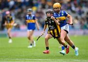 6 July 2025; Molly Mí Raghallaigh, Gaelscoil Uí Fhiaich, Maigh Nuad, Cill Dara, representing Kilkenny in action against Ella McDaid, St Aengus NS, Brigend, Donegal, representing Tipperary during the GAA INTO Cumann na mBunscol Respect Exhibition Go Games match at the GAA Hurling All-Ireland Senior Championship semi-final match between Kilkenny and Tipperary at Croke Park in Dublin. Photo by David Fitzgerald/Sportsfile