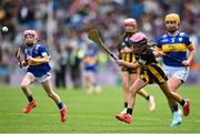 6 July 2025; Molly Mí Raghallaigh, Gaelscoil Uí Fhiaich, Maigh Nuad, Cill Dara, representing Kilkenny in action against Ella McDaid, St Aengus NS, Brigend, Donegal, representing Tipperary during the GAA INTO Cumann na mBunscol Respect Exhibition Go Games match at the GAA Hurling All-Ireland Senior Championship semi-final match between Kilkenny and Tipperary at Croke Park in Dublin. Photo by David Fitzgerald/Sportsfile